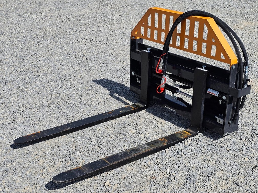 Unused Wolverine Hydraulic Adjustable Pallet Forks - Skid Steer Quick Attach - PFA-11-3300G