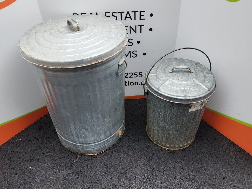 (2) Galvanized Metal Trash Cans Measure 28" Tall and 18" Tall