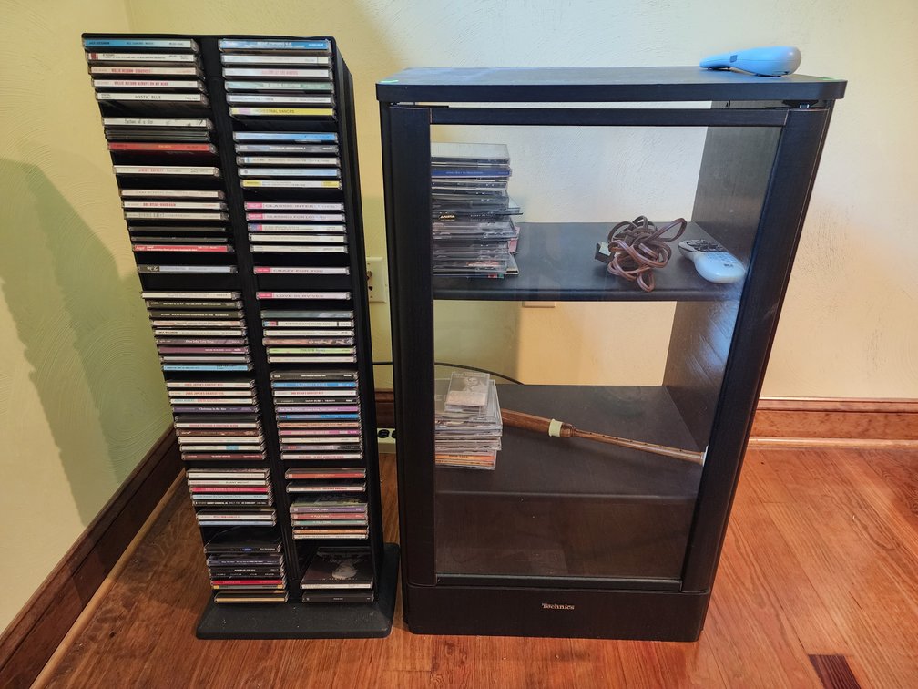 Stereo Cabinet w/ Assorted CDs and More Measures 35.5" Tall x 21" Wide x 15.5" Deep - CD Tower Stand w/ Assorted CDs
