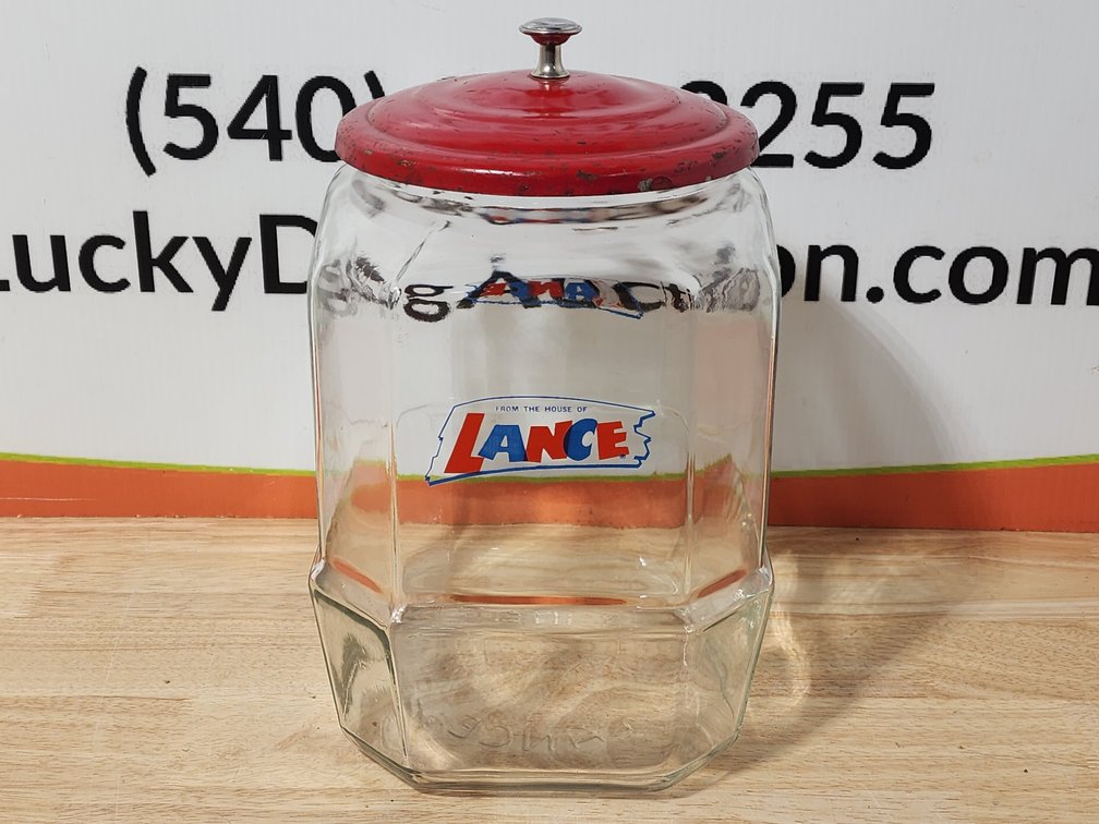 "From The House Of Lance" Glass Jar W/ Lid Measures 12" Tall 