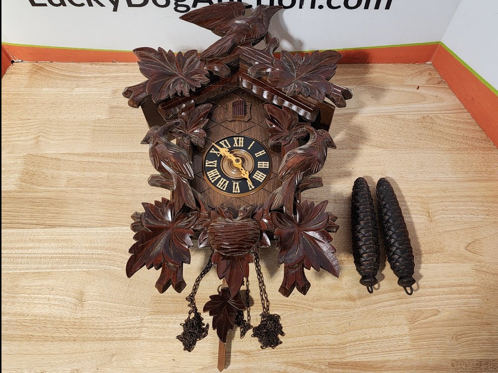 Hand Carved Bird and Leaf Cuckoo Clock 