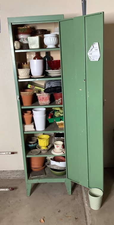 Storage Cabinet Full of Flower Pots