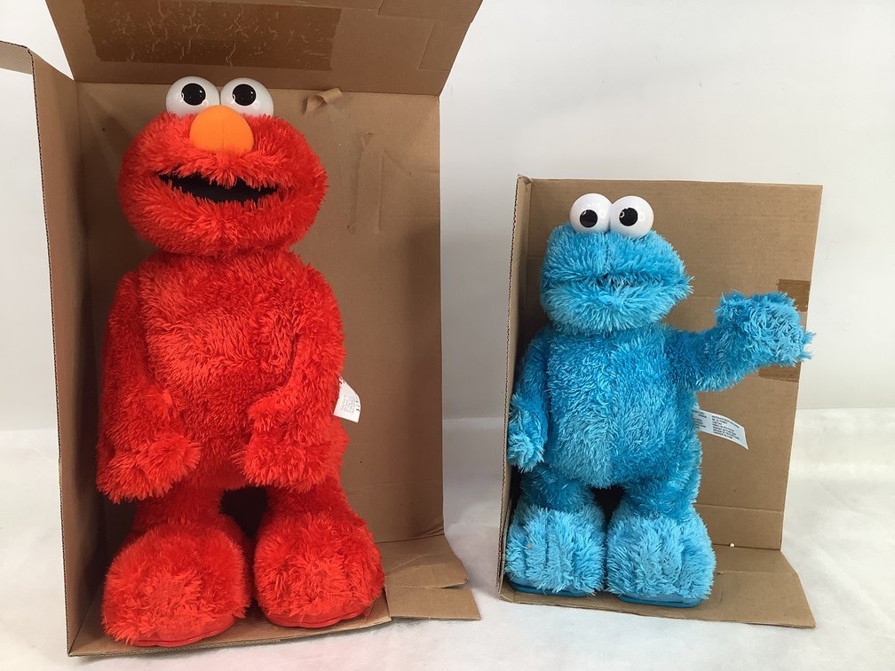 New Tickle Me Elmo and Cookie Monster