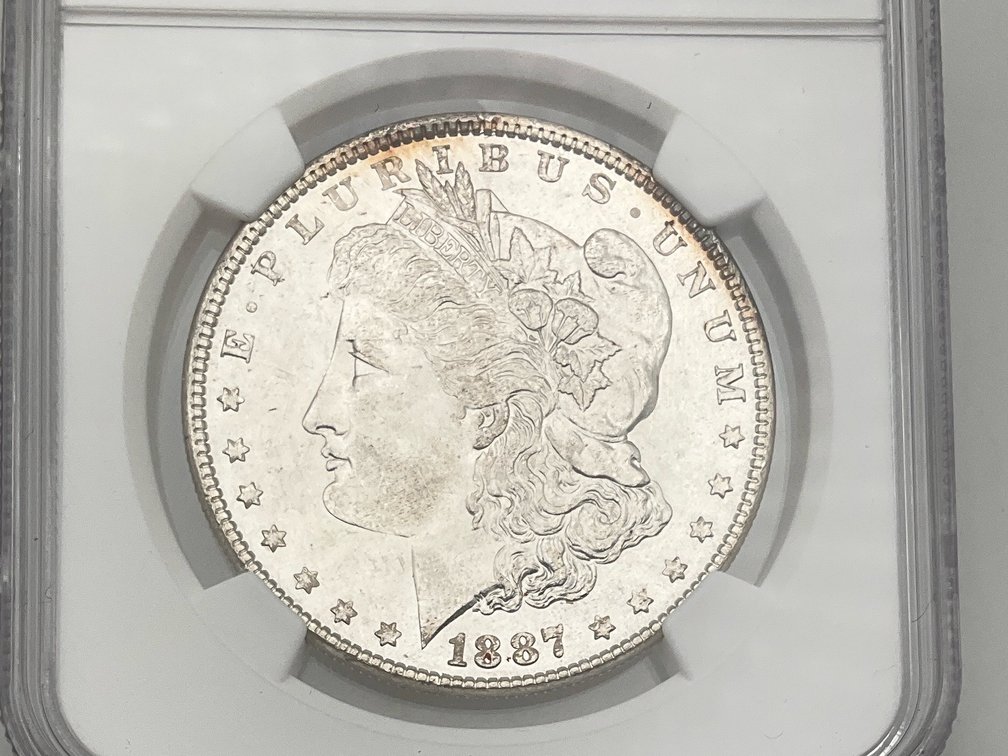 1887 Morgan Dollar NGC MS 62