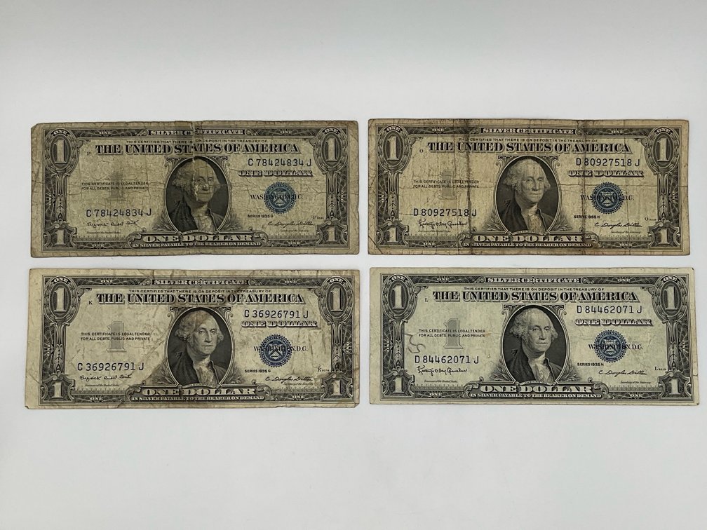 Four 1935 G & H $1 Silver Certificates