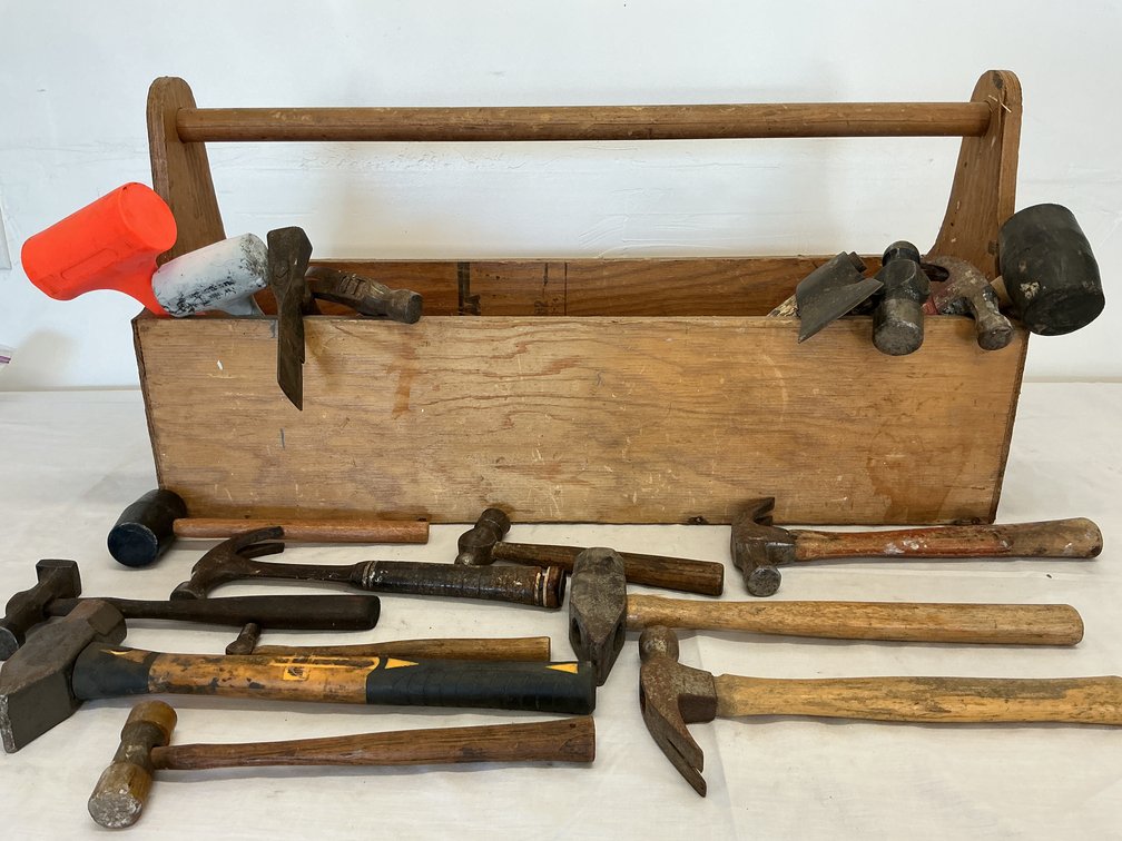 Array of Hammers, Axes, Mallets and a Wooden Toolbox