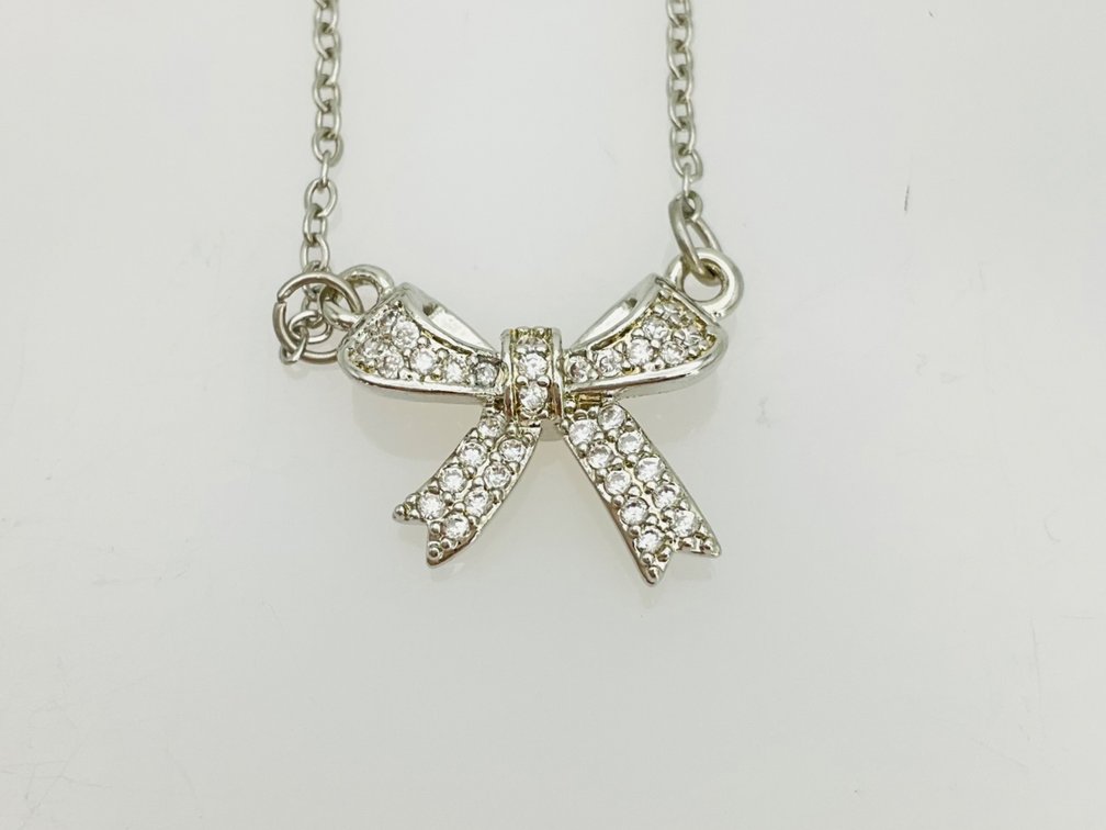 Stainless Steel and Rhinestone Bow Necklace