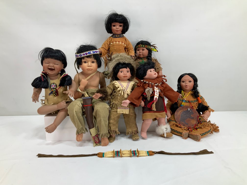 7 Native American Porcelain Dolls