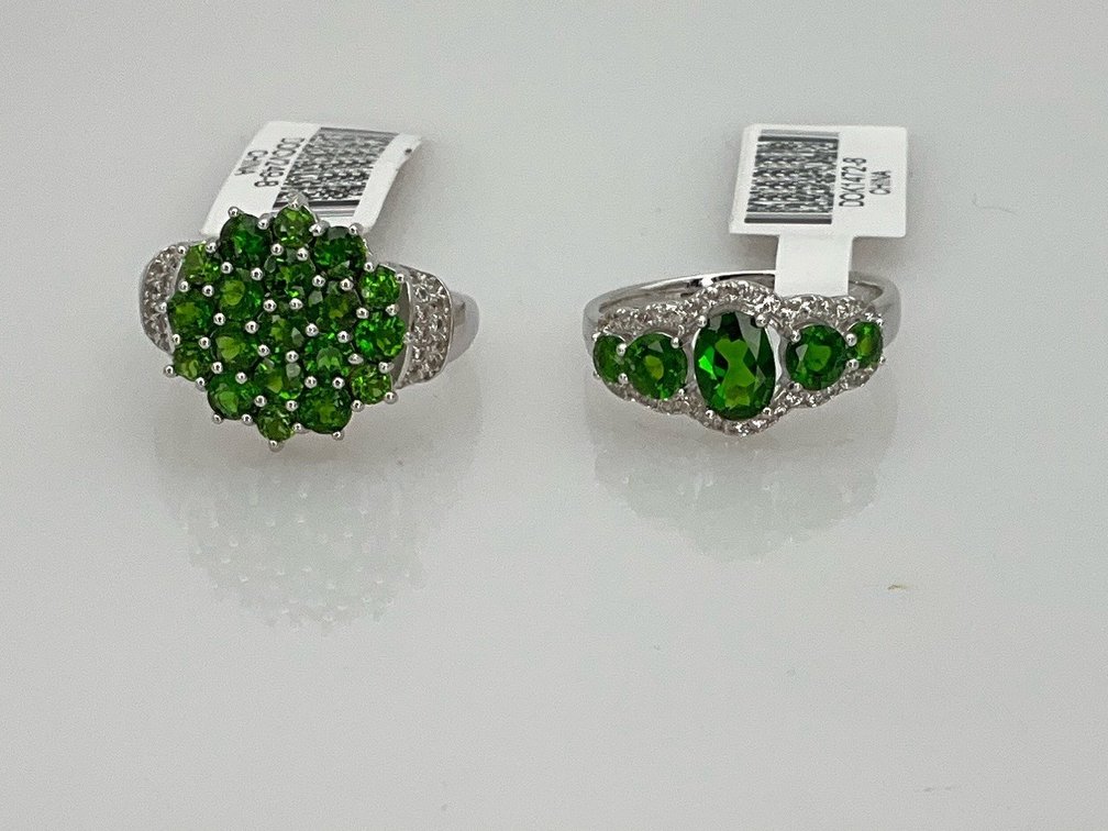 Two Sterling Silver and Green Gemstone Rings