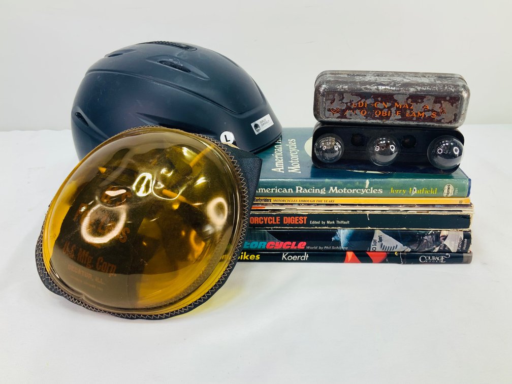 Helmet, Automotive Lamp Tin, Fog Lenses, and Motorcycle Books