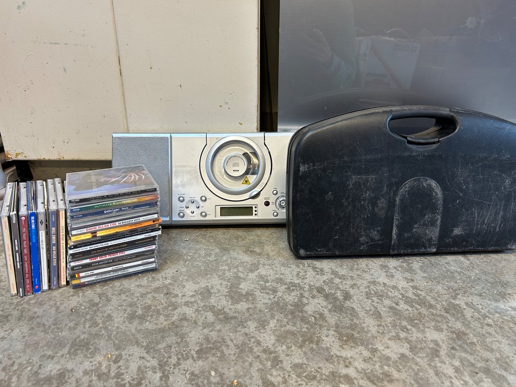 Stereo, Carrying Case, and Audio CDs