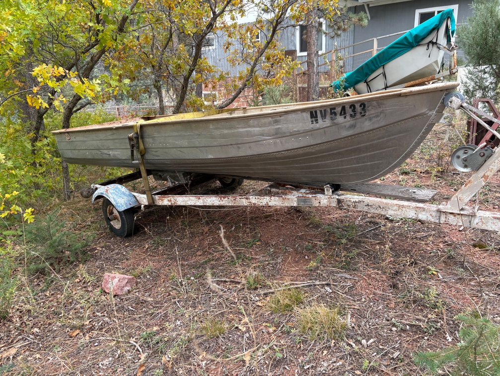 Riveted Aluminum Utility Boat on Trailer with Oars