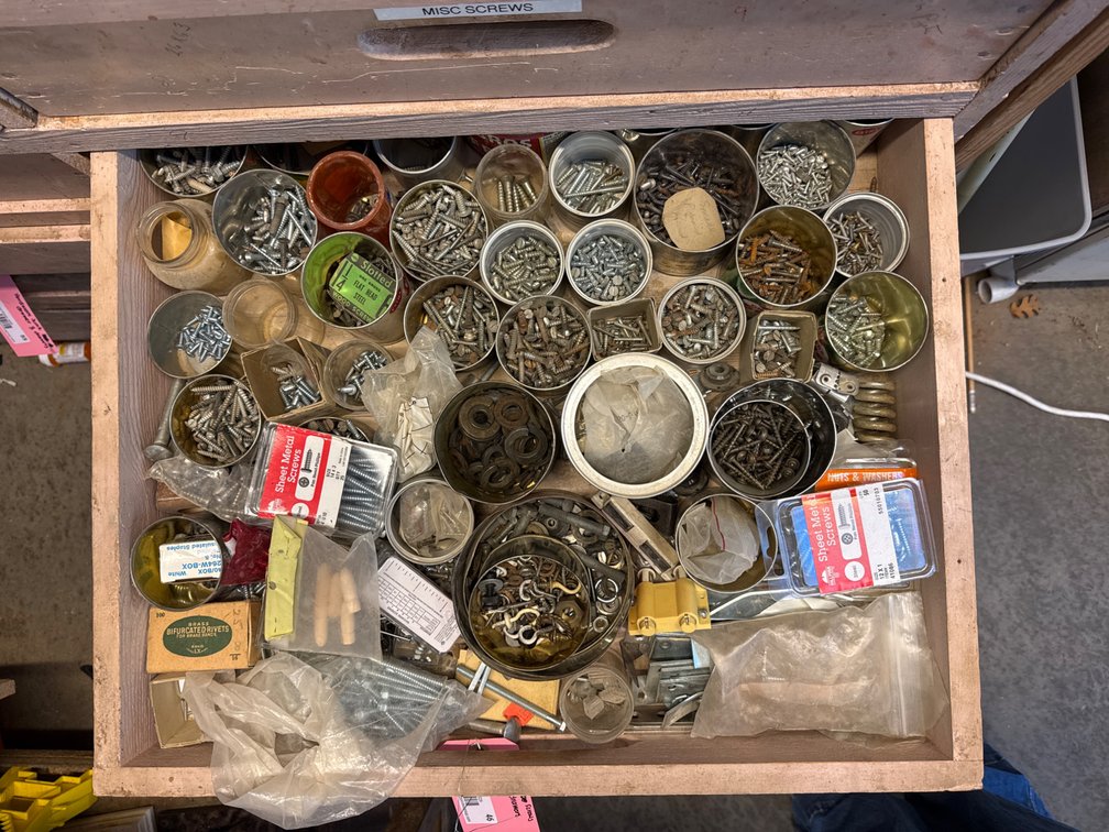 Screws, Bolts, Washers, and Fasteners in Wooden Drawers
