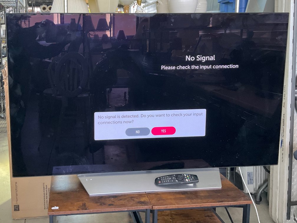 LG OLED55C7P Television with Stand and Remote Control