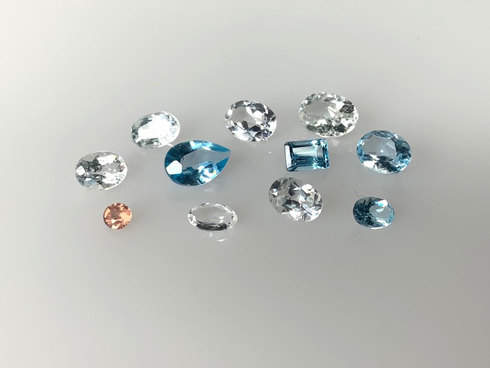 Eleven Loose Faceted Gemstones in Oval, Pear, and Emerald Cuts