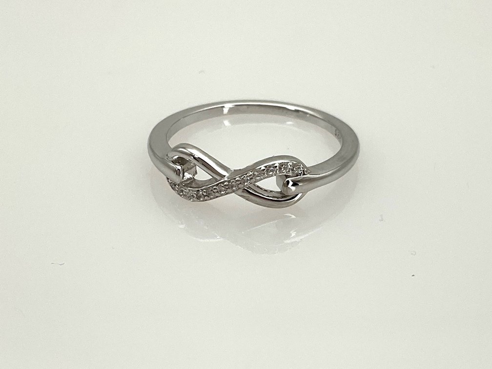 Sterling Silver Infinity Motif Ring with Clear Cubic Zurconias