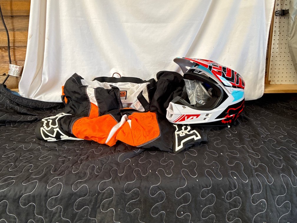 Motocross Helmet, Goggles, and Riding Pants