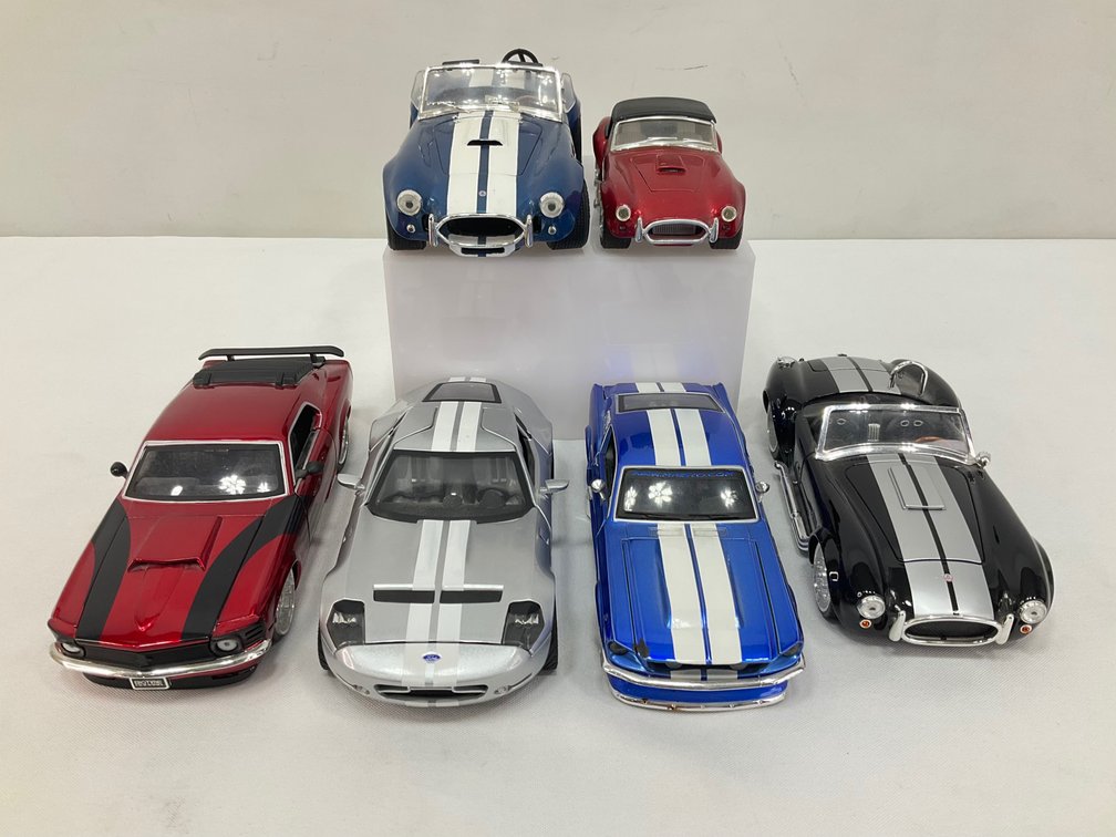 Six 1:18 and 1:24 Scale Die-Cast Model Cars