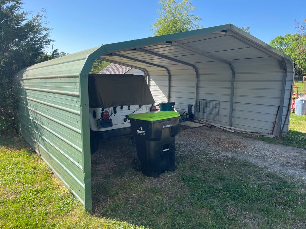 Green metal car port-Buyer responsible for removal