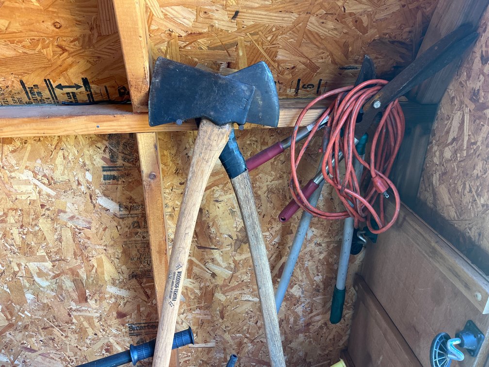 Two axes, two sets of loppers, & extension chord