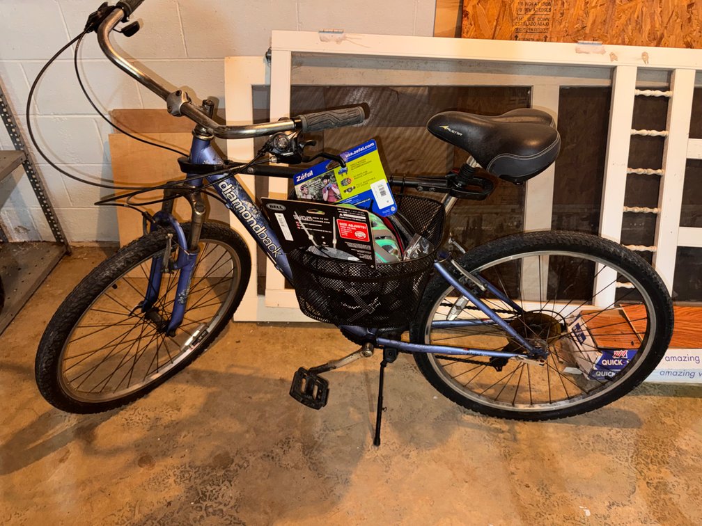 Columbia 21 speed Woman's Mountain Bike & 2 Brand New Helmets