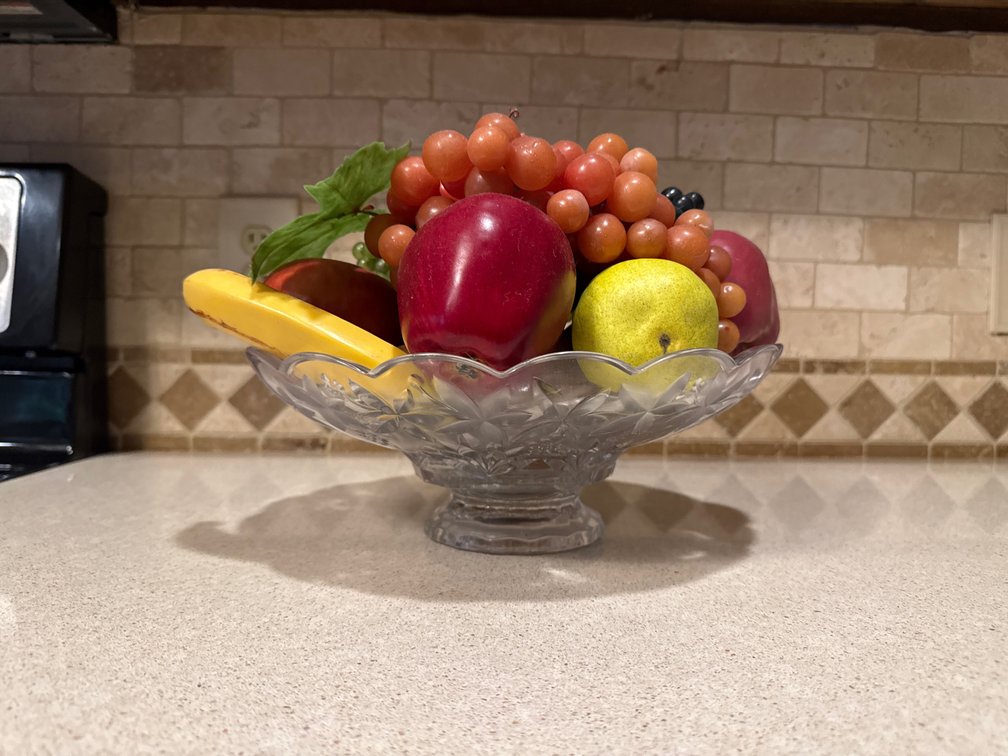 Bowl with plastic fruit