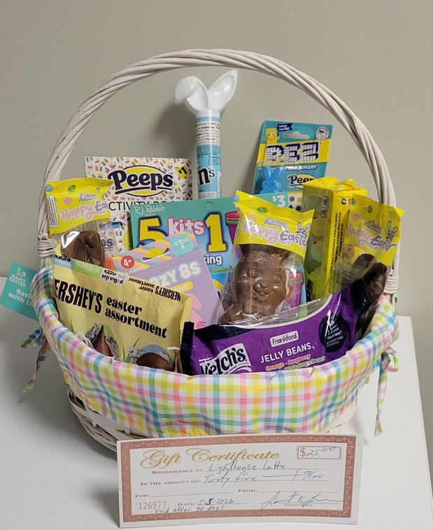 Easter Basket includes three milk chocolate bunnies, pack of marshmallow peeps, bag of assorted chocolate eggs, bag of jelly beans, M&M’s candies, Pez candy dispenser with candy, activity book with markers, egg decorating kit, Crazy 8 card game, and $25 L