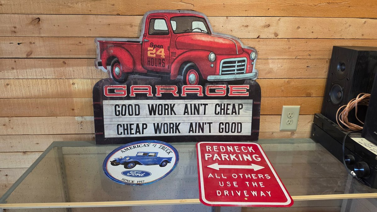 Three metal signs