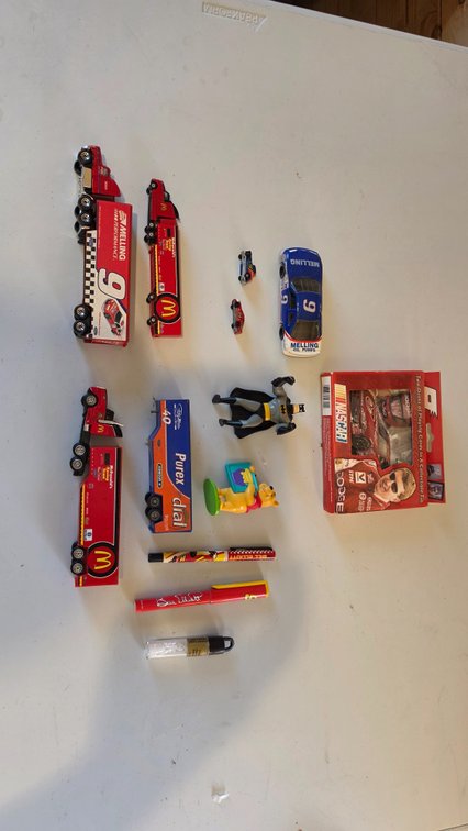 Multiple semis, plays cards, and misc items