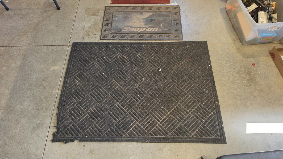 Three floor mats - good shape (black ' 4' x 3') (Snap-on 30" x 18") ( Red 24" x 15")