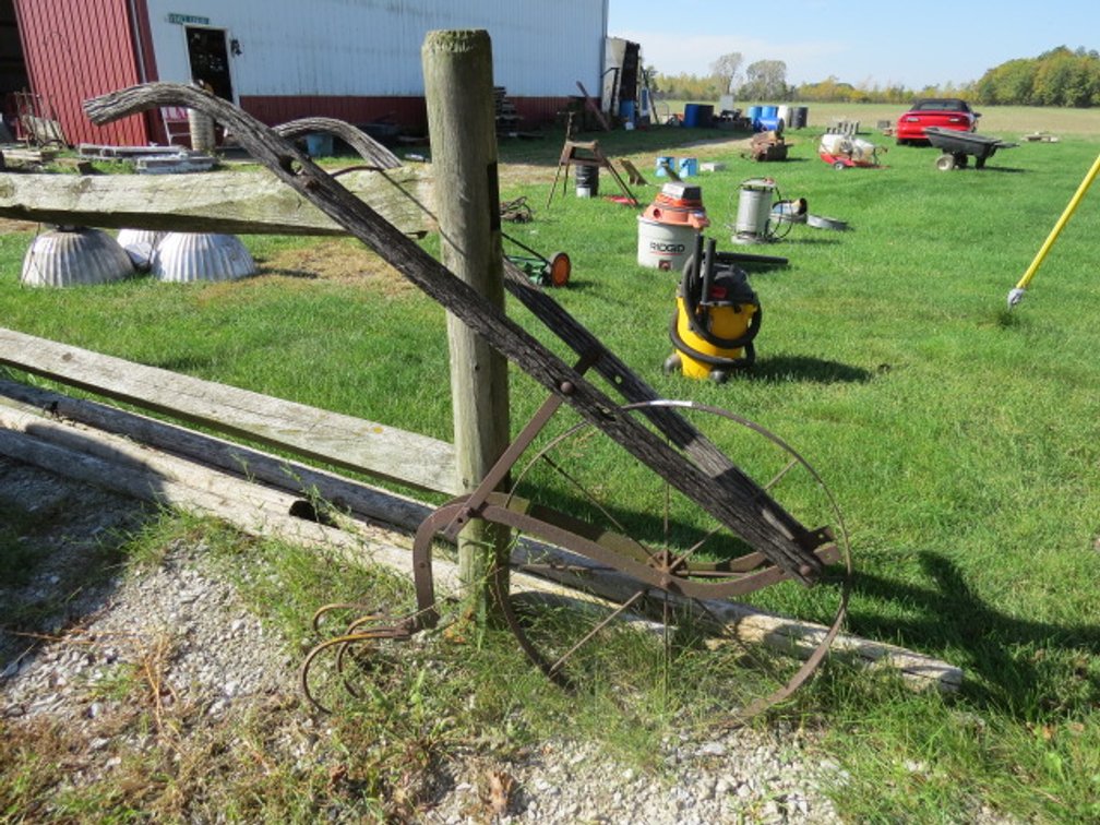 Walk behind garden plow