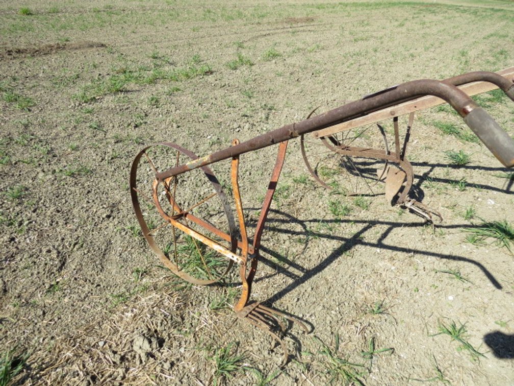 Antique metal garden plow