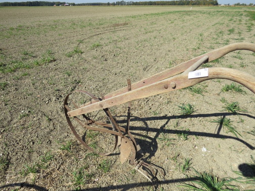 Antique metal garden plow