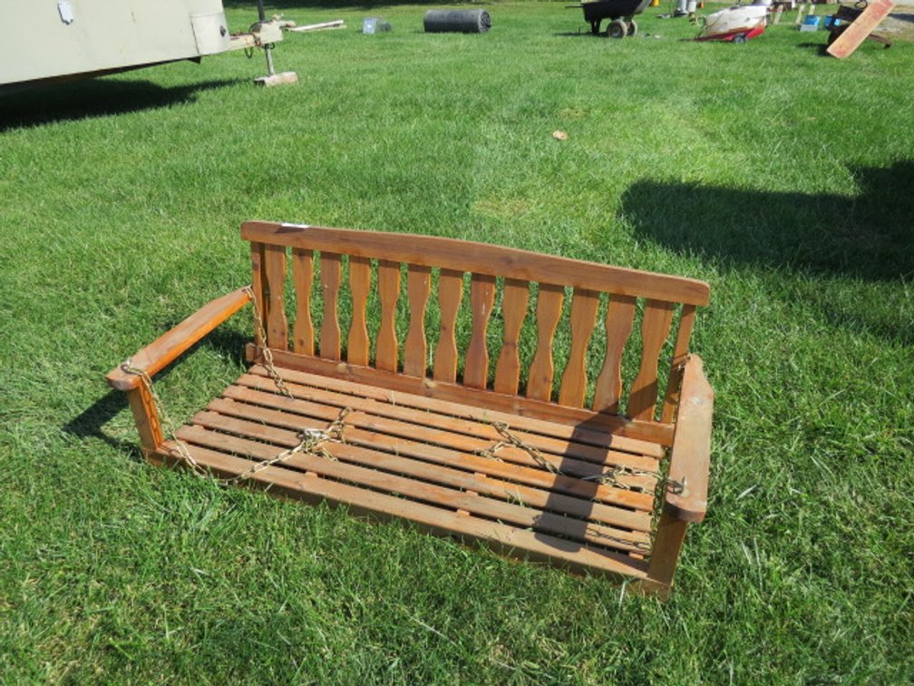 Wooden porch swing