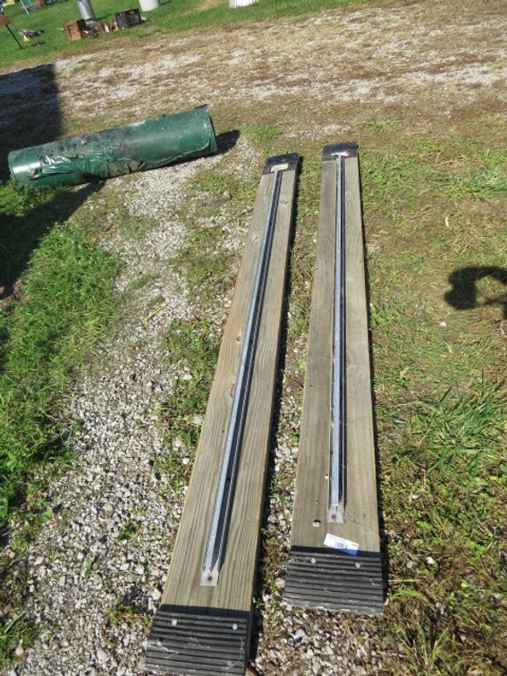 Pair of wooden loading ramps