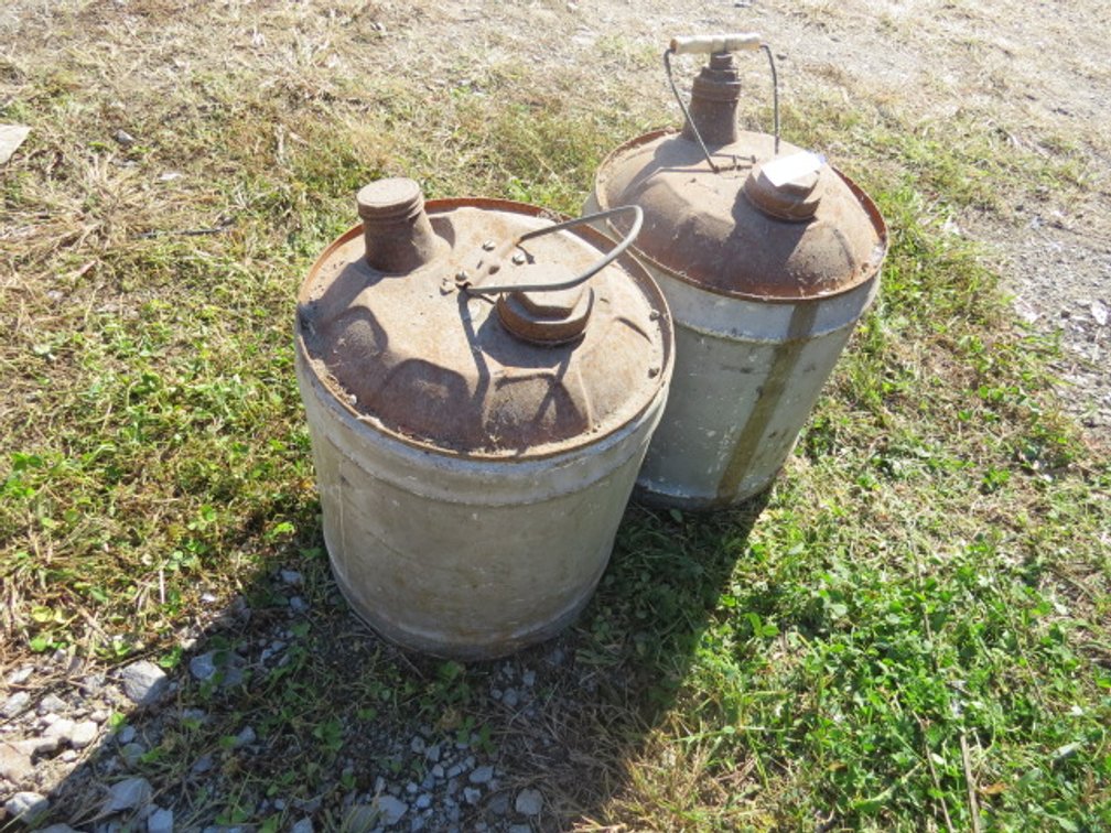 (2) "Matching" antique gas cans