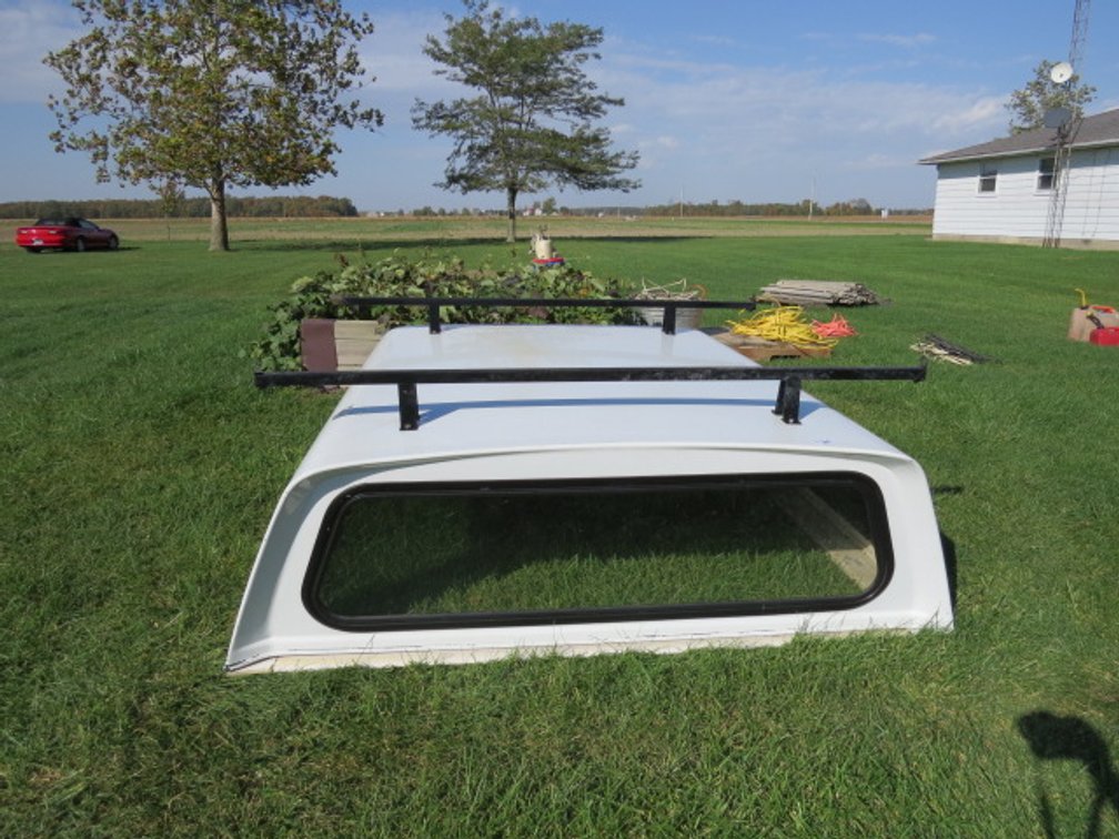 Action white fiberglass truck topper