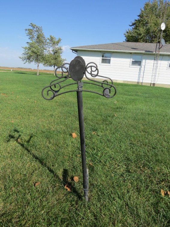 Free-Standing metal garden hose holder/stand