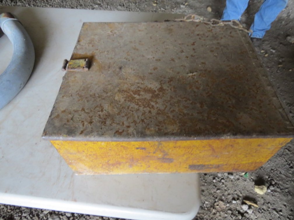 Yellow Metal Container with Miscellaneous Items