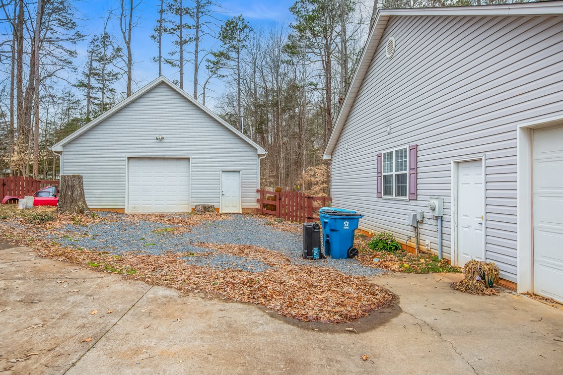 Charming Pleasant Garden Home on Spacious Lot with Large Shop