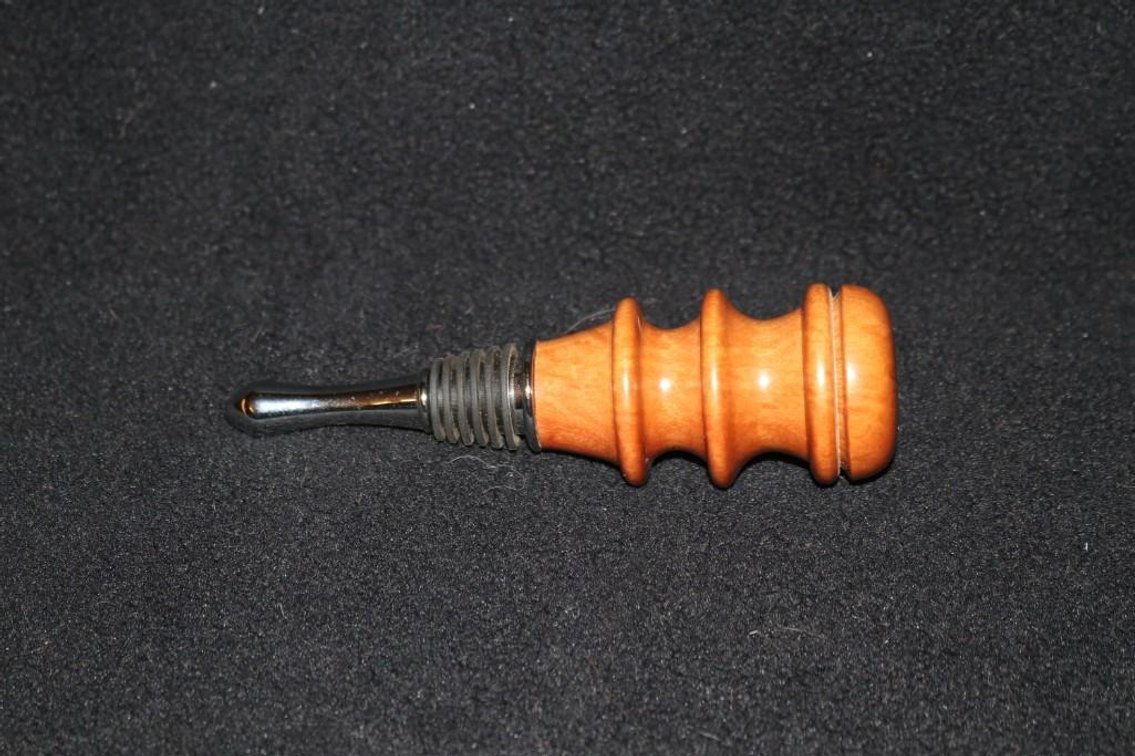 Custom Wood Wine Stopper handcrafted by J.J. Thompson (WSPD) made of Pink Ivory wood