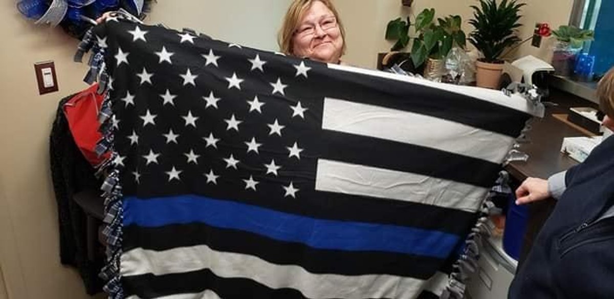 Thin Blue Line blanket and customized cup donated by Lisa Nowak (WSPD).  