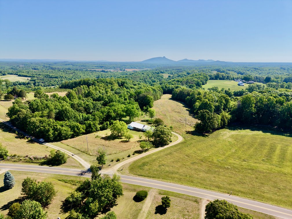 JUDICIAL AUCTION - 14.9 +/- Acres and Home with Pilot Mountain Views in Boonville, NC