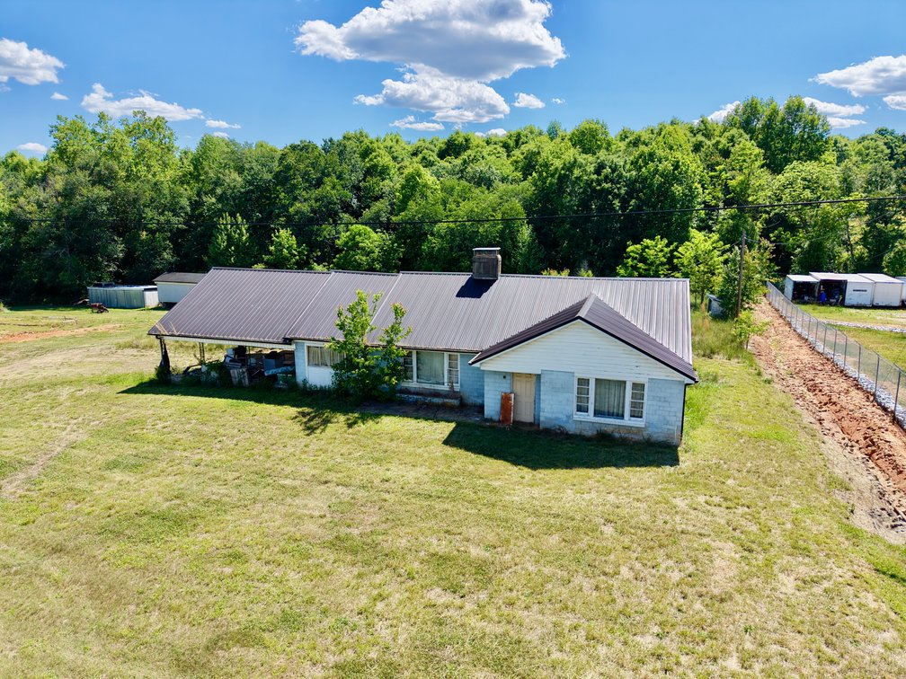 JUDICIAL AUCTION - .91 +/- Acres, Home and Office with NC Hwy. 16 Frontage in Taylorsville, NC