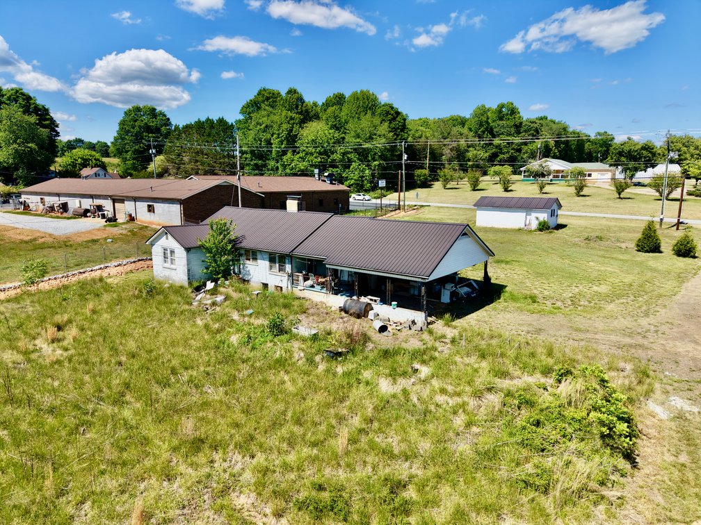 JUDICIAL AUCTION - .91 +/- Acres, Home and Office with NC Hwy. 16 Frontage in Taylorsville, NC