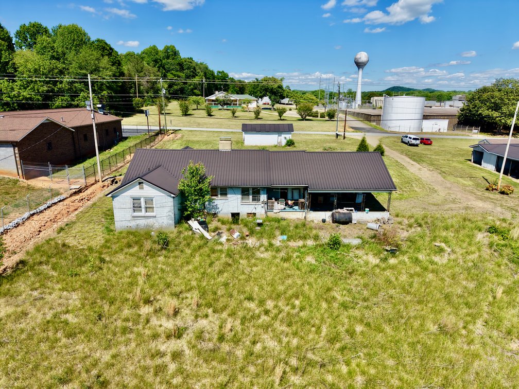 JUDICIAL AUCTION - .91 +/- Acres, Home and Office with NC Hwy. 16 Frontage in Taylorsville, NC