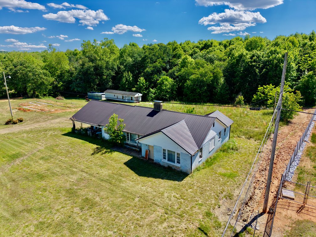 JUDICIAL AUCTION - .91 +/- Acres, Home and Office with NC Hwy. 16 Frontage in Taylorsville, NC