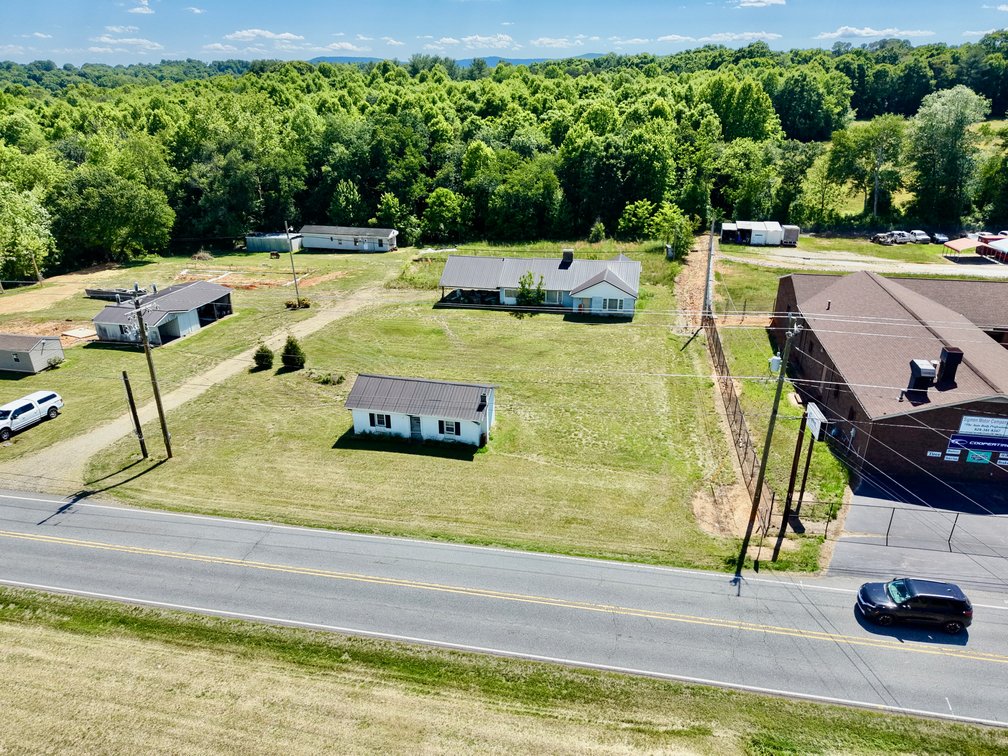 JUDICIAL AUCTION - .91 +/- Acres, Home and Office with NC Hwy. 16 Frontage in Taylorsville, NC