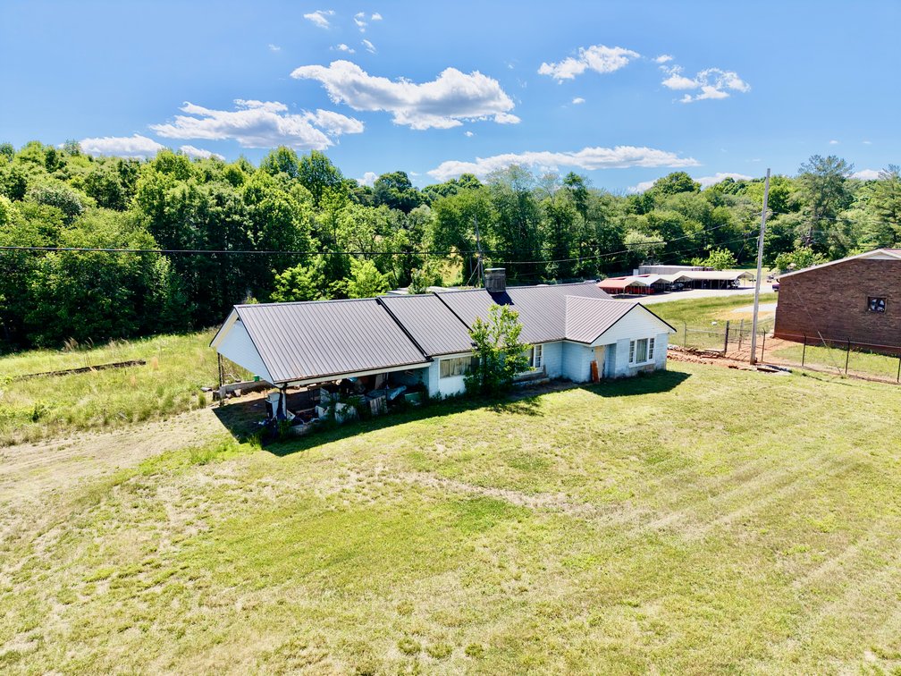 JUDICIAL AUCTION - .91 +/- Acres, Home and Office with NC Hwy. 16 Frontage in Taylorsville, NC