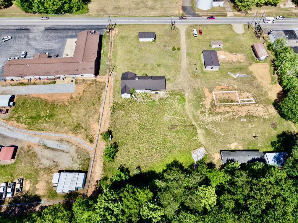 JUDICIAL AUCTION - .91 +/- Acres, Home and Office with NC Hwy. 16 Frontage in Taylorsville, NC